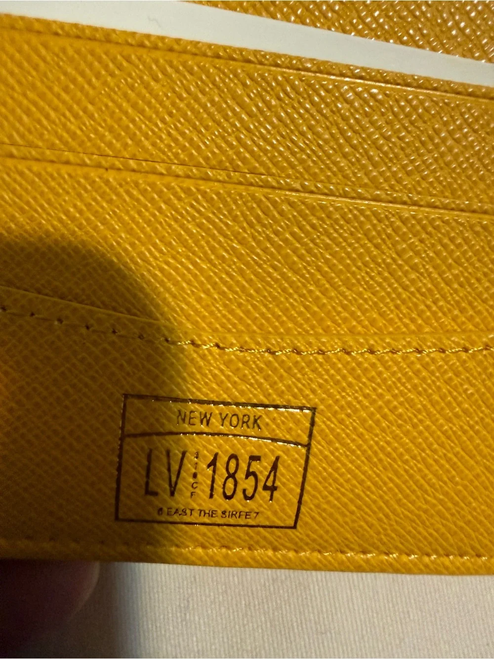 Louis Vuitton Yellow Textured Leather Bifold Wallet